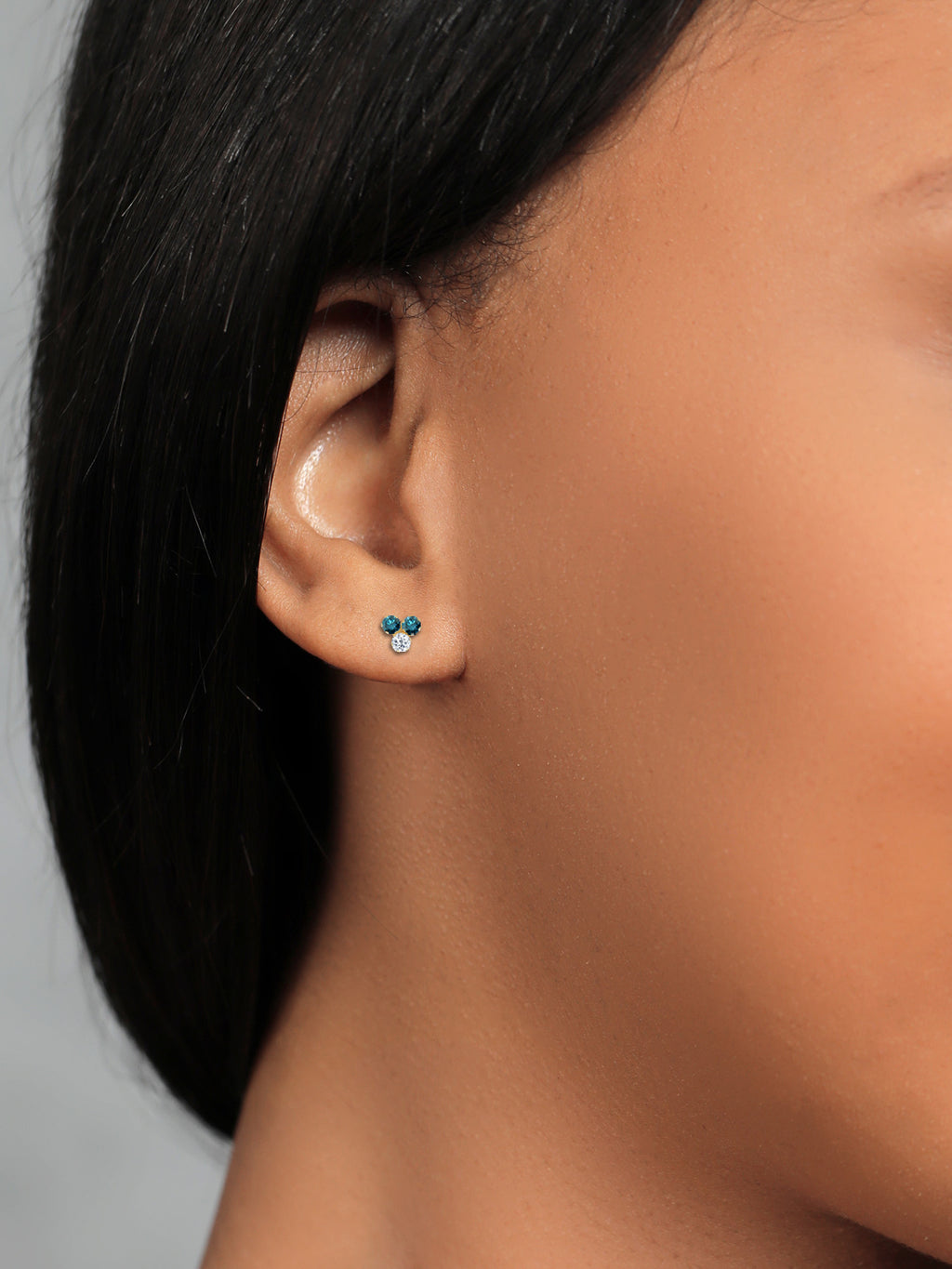 14K Yellow Gold Blue Diamond and White Topaz Three Stone Stud Earrings A731522